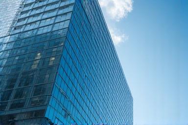 Modern professional office building in London City district representing the legal authority of Umbra Legal Co.